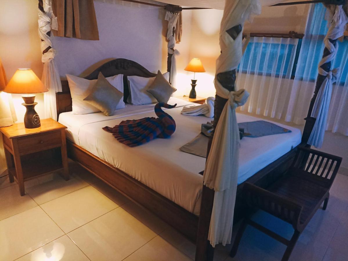 Kusnadi Hotel Legian Extérieur photo