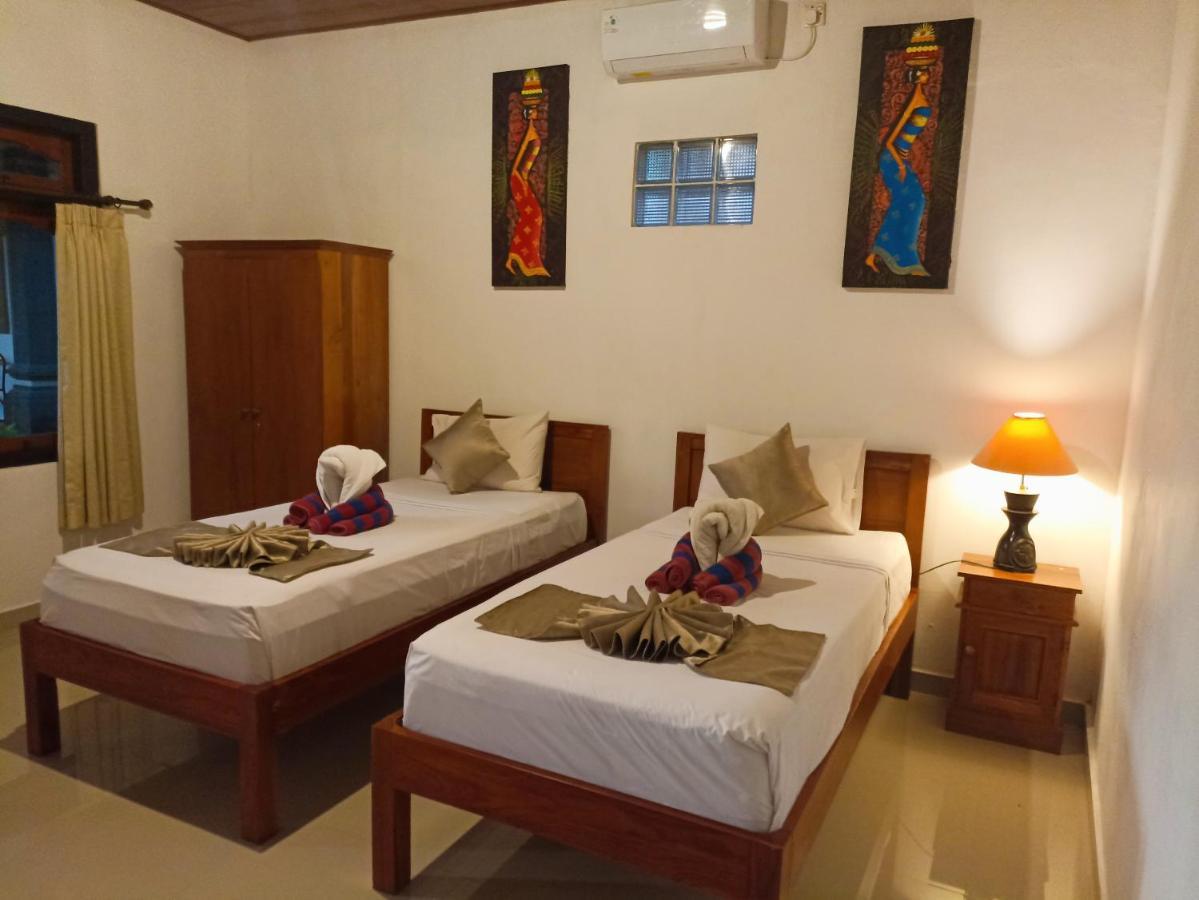 Kusnadi Hotel Legian Extérieur photo