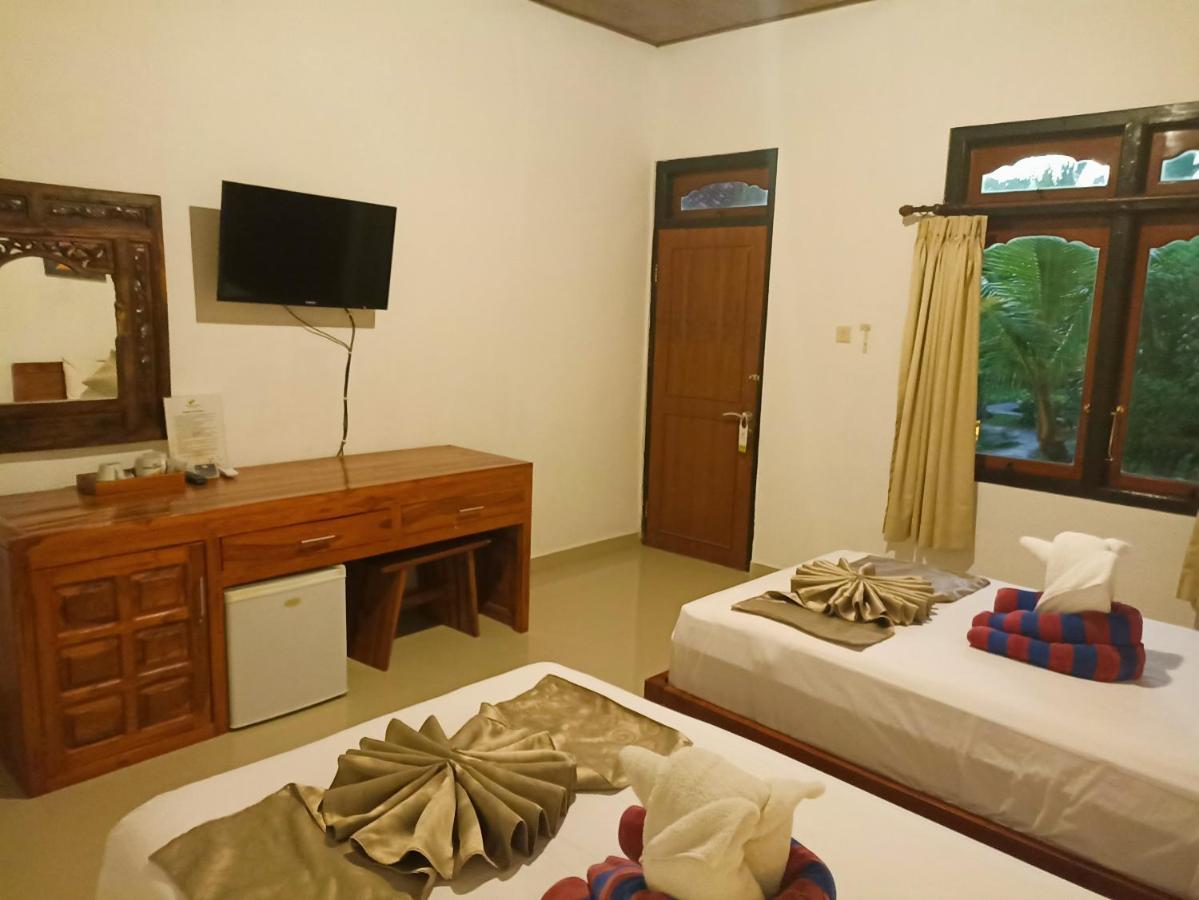 Kusnadi Hotel Legian Extérieur photo