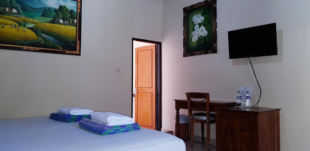 Kusnadi Hotel Legian Extérieur photo