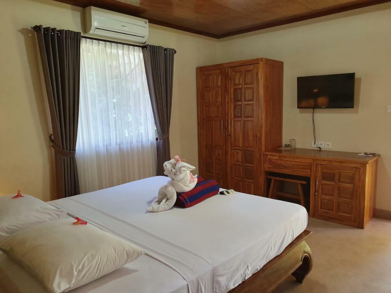 Kusnadi Hotel Legian Extérieur photo